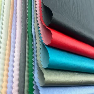 Top Selling 100% Polyester Nylon Taffeta Crepe Style PU Coated Fabric High Quality Winter Casual Jacket Material Knitted Backing