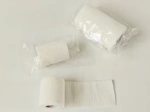 Waterproof Hypoallergenic First Aid Dressing Rolls Medical Self adhesive PBT High Elastic Gauze Bandage for Medical Fixation